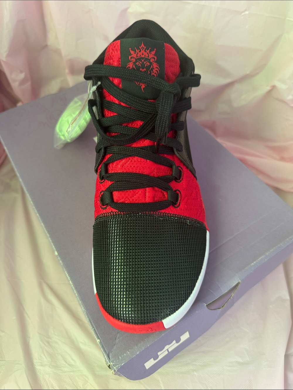Red and Black Athletic Shoe with Lion Crest